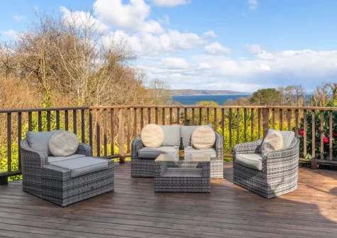 The wrap-around decked terrace & outdoor sitting area at Glendale, Saundersfoot