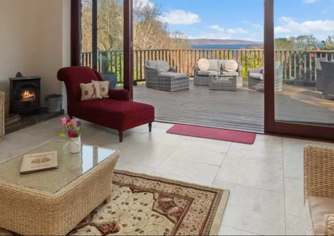 Glendale, Saundersfoot is a gorgeous three-bedroom retreat hidden in a peaceful valley yet close to the village, featuring stunning sea views, a wrap-around terrace, wood-fired hot tub, and direct private access to a sheltered sandy beach.