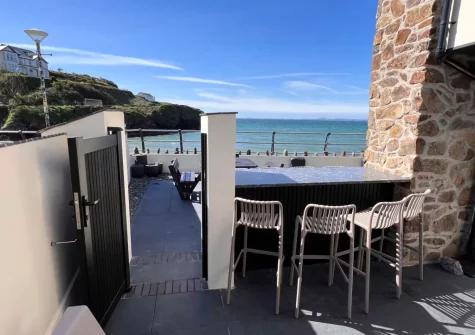 The enclosed patio & alfresco dining area at Graftons, Little Haven