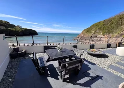 The enclosed patio & alfresco dining area at Graftons, Little Haven