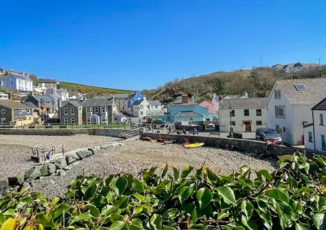Holidaymakers & locals create a lively bustle throughout this old fishing village on sunny days