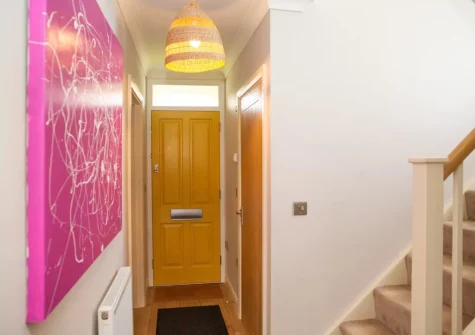 The entrance hallway & stairs up to the first floor at Green Meadows, Newport