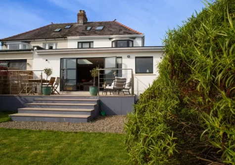 The patio, outdoor sitting area & enclosed lawned garden at Green Meadows, Newport