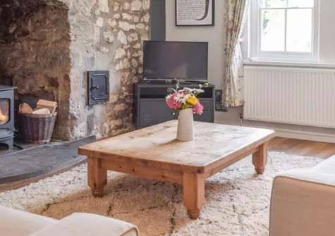 Hafan Fach Cottage, Maidenwells is a peaceful two-bedroom retreat in the Pembrokeshire countryside, featuring a private hot tub, cosy woodburner, and garden with firepit, perfectly placed for exploring medieval castles and dramatic coastal scenery.