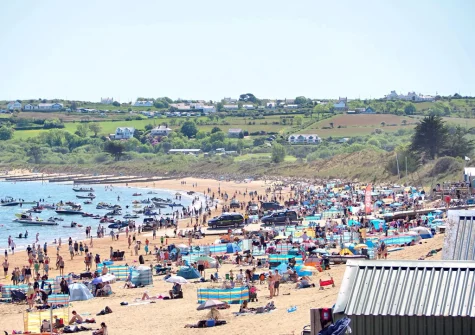 Abersoch Beach is renowned for its golden sandy shores & crystal-clear waters, making it the perfect spot for sunbathing & sandcastle building
