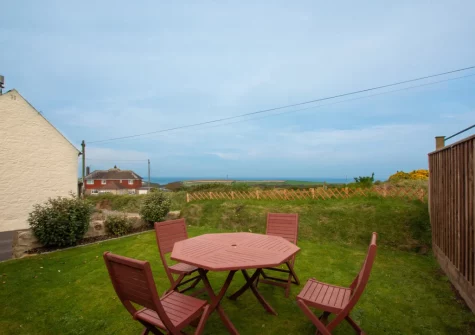 The garden & alfresco dining area at Hafan Penrhyn, LLanrhian