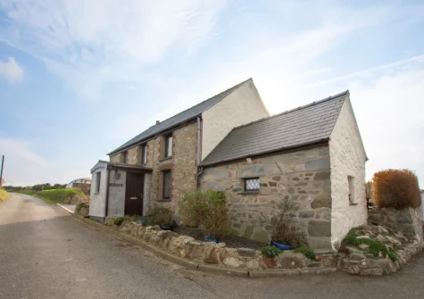 Hafan Penrhyn is a traditional stone cottage for four with lovely sea views, in a rural location with beaches nearby