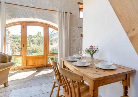 The dining area at Harmony Cottage, Trefasser