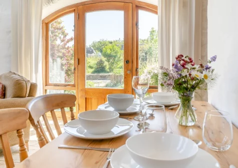 The dining area at Harmony Cottage, Trefasser