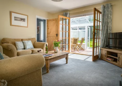 The living room at Hawthorn Cottage at Woodlands Farm, Little Haven