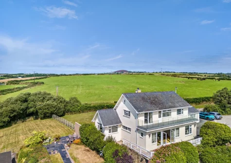 Hillside sits in an rlevated & central Abersoch location with countryside, village and ocean views