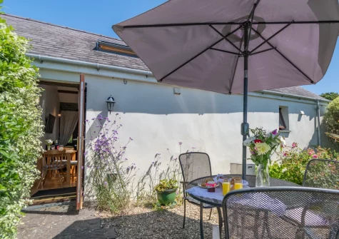 The patio & alfresco dining area at Holly Cottage, Haverfordwest