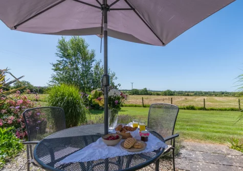 The patio & alfresco dining area at Holly Cottage, Haverfordwest