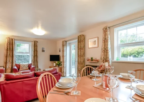 The living & dining area at Honeysuckle Cottage, Broad Haven
