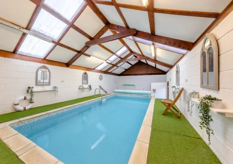The shared indoor heated swimming pool at Hunter's Hollow, St Florence