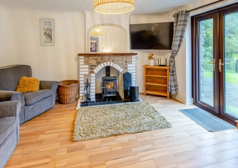 Hunter's Hollow, St Florence is a beautifully appointed cottage near Tenby, featuring a private hot tub, cosy wood burner, and use of an indoor heated pool, perfectly placed for exploring Pembrokeshire's stunning coastline and attractions.