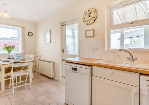 The kitchen & dining area at Just Beachy, Broad Haven