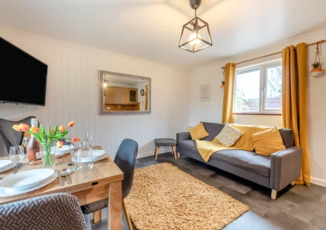 The living & dining area at Keepers Cottage at East Tarr Farm, St Florence