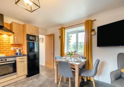 The kitchen & dining area at Keepers Cottage at East Tarr Farm, St Florence