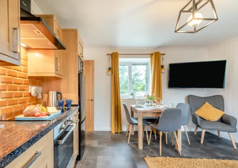 The kitchen & dining area at Keepers Cottage at East Tarr Farm, St Florence