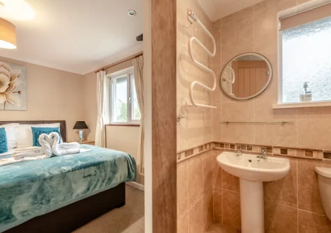 Bedroom #1 & Jack 'n Jill bathroom at Keepers Cottage at East Tarr Farm, St Florence