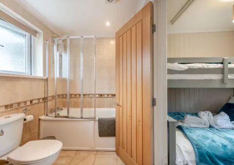 Jack 'n Jill bathroom & bedroom #2 at Keepers Cottage at East Tarr Farm, St Florence