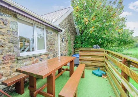 The terrace & alfresco dining area at Keepers Cottage at East Tarr Farm, St Florence