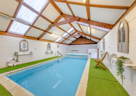 The shared indoor swimming pool at Keepers Cottage at East Tarr Farm, St Florence