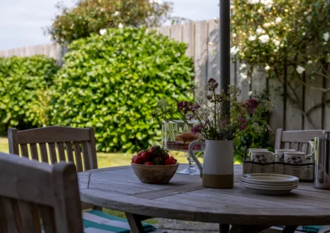 The alfresco dining area & enclosed garden at Kelwon Cottage, St Brides