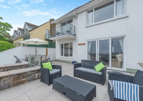 The patio, alfresco dining & outdoor sitting area at Landfall, Saundersfoot