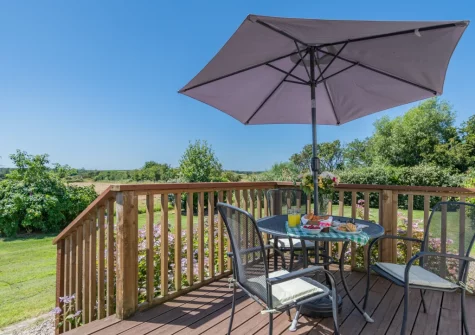 The south facing decked patio & alfresco dining area at Lavender Cottage, Haverfordwest