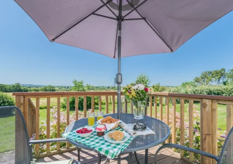 The south facing decked patio & alfresco dining area at Lavender Cottage, Haverfordwest