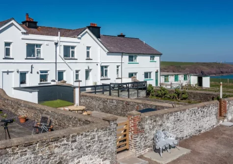 Lighthouse Row is a beautiful terraced cottage sits on the clifftops of St Ann's headland