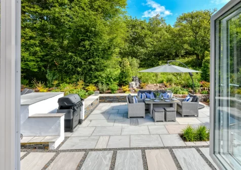 The patio, barbecue & alfresco dining area at Llyn Orta, Llanbedrog