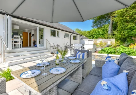 The patio, barbecue & alfresco dining area at Llyn Orta, Llanbedrog
