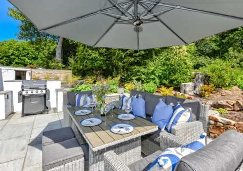 The patio, barbecue & alfresco dining area at Llyn Orta, Llanbedrog