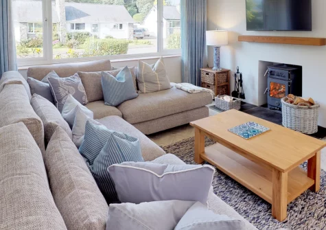 Llyn Orta, Llanbedrog is a beautifully refurbished detached bungalow just moments from the beach, featuring contemporary coastal interiors, a warming wood burner, enclosed patio with dining area, and access to the Llŷn Peninsula's finest walks.