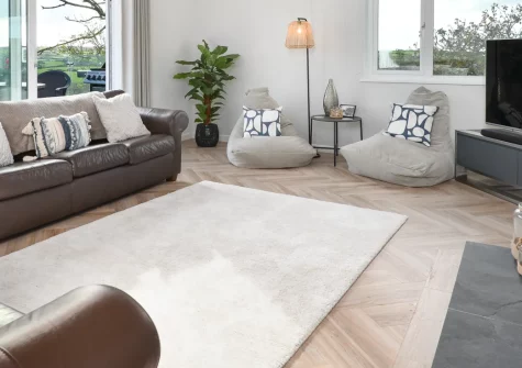 Maes Coch, Abersoch is a stunning five-bedroom detached house in an elevated position above this popular sailing village, boasting spectacular Cardigan Bay and Snowdonia views from a glass-fronted balcony, and beaches on the doorstep.