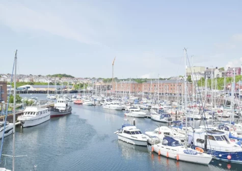 The stunning marina view from the balcony, living & dining area at Marina Retreat, Milford Haven