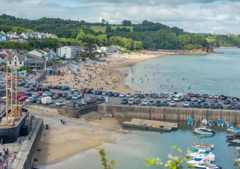 Saundersfoot is a charming, family-friendly seaside village renowned for its golden sandy beach, bustling working harbou, and ranked among the best UK seaside towns