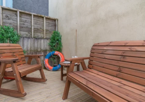 The enclosed courtyard garden & outdoor sitting area at May's Place, Tenby