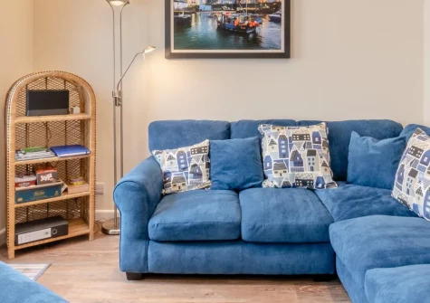 May's Place, Tenby is a thoughtfully designed three-bedroom cottage in central Tenby, featuring enhanced accessibility with lift access, modern interiors, and an enclosed courtyard garden, just moments from golden beaches and medieval town walls.
