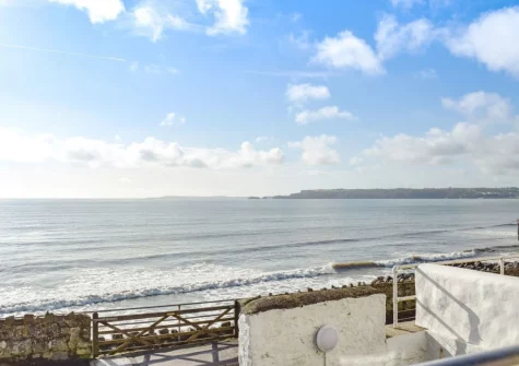 The sea view from the balcony & outdoor sitting area at Mole End, Amroth