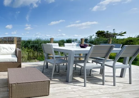 The large decked terrace, alfresco dining & outdoor sitting area at Morannedd, Bwlchtocyn