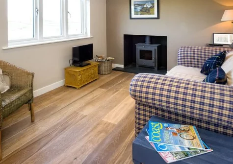 Morannedd, Bwlchtocyn is an exceptional four-bedroom retreat elevated between Abersoch and Bwlchtocyn, boasting breathtaking panoramic views across Cardigan Bay to Snowdonia, a stunning decked terrace with infinity glass, and stylish interiors.