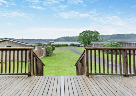 The lake view from the decked terrace & alfesco dining area at Morning Tide, Burton Ferry