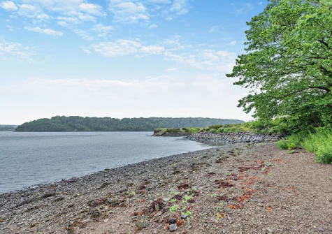 Enjoy easy access to the water via a private gate, making this location ideal for boating & paddling