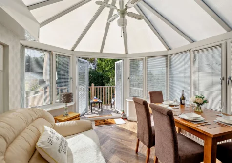 The dining area at North Bay Bungalow, Rhos on Sea