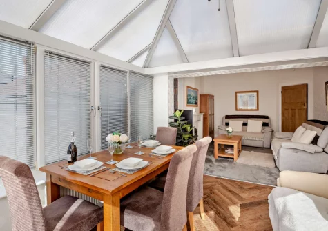 The dining area at North Bay Bungalow, Rhos on Sea