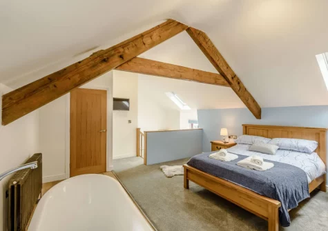 The bedroom at Nyth Y Wennol, Maenan